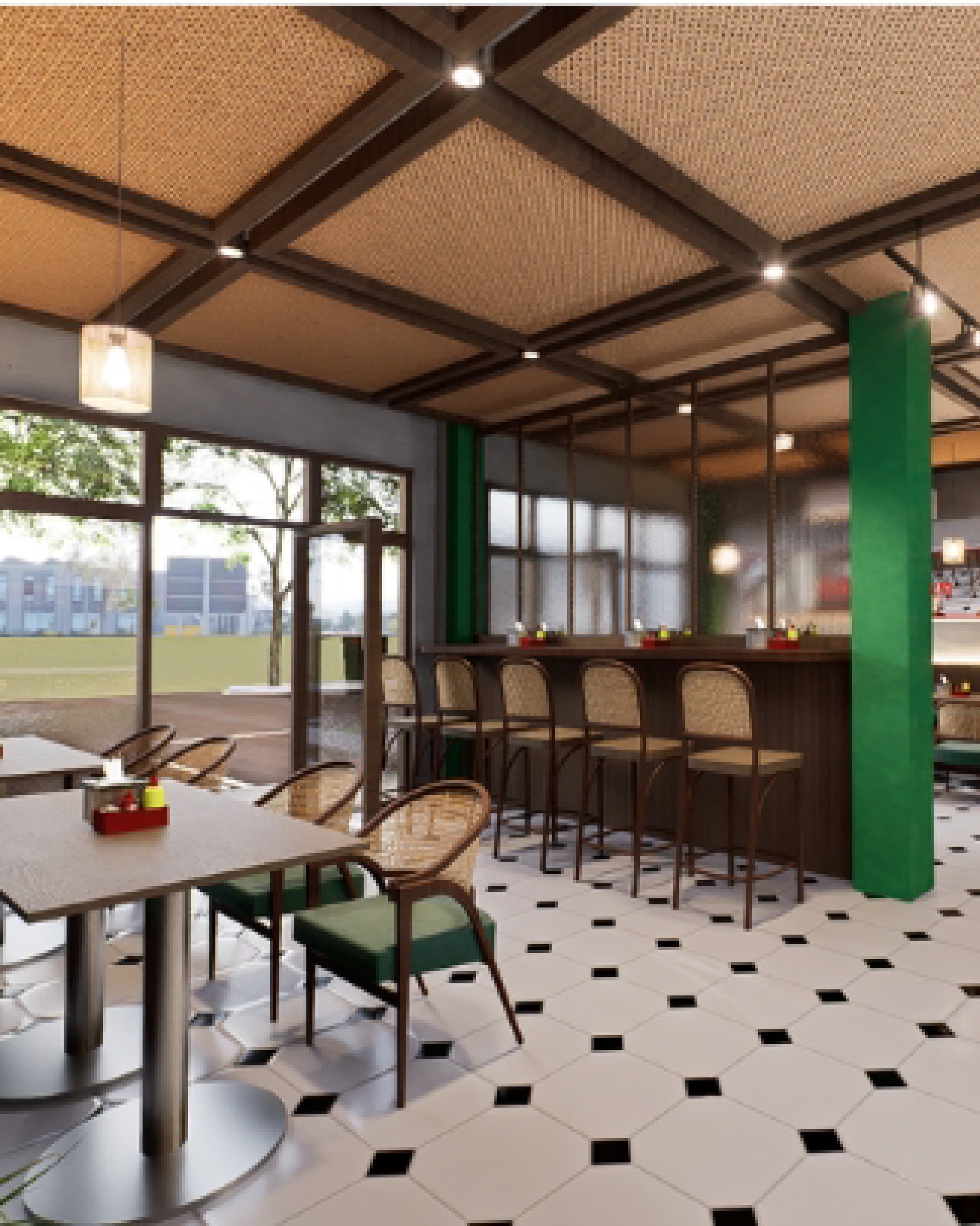 Wide view of the dining hall with green structural columns, bar seating and potted plants along the aisle.