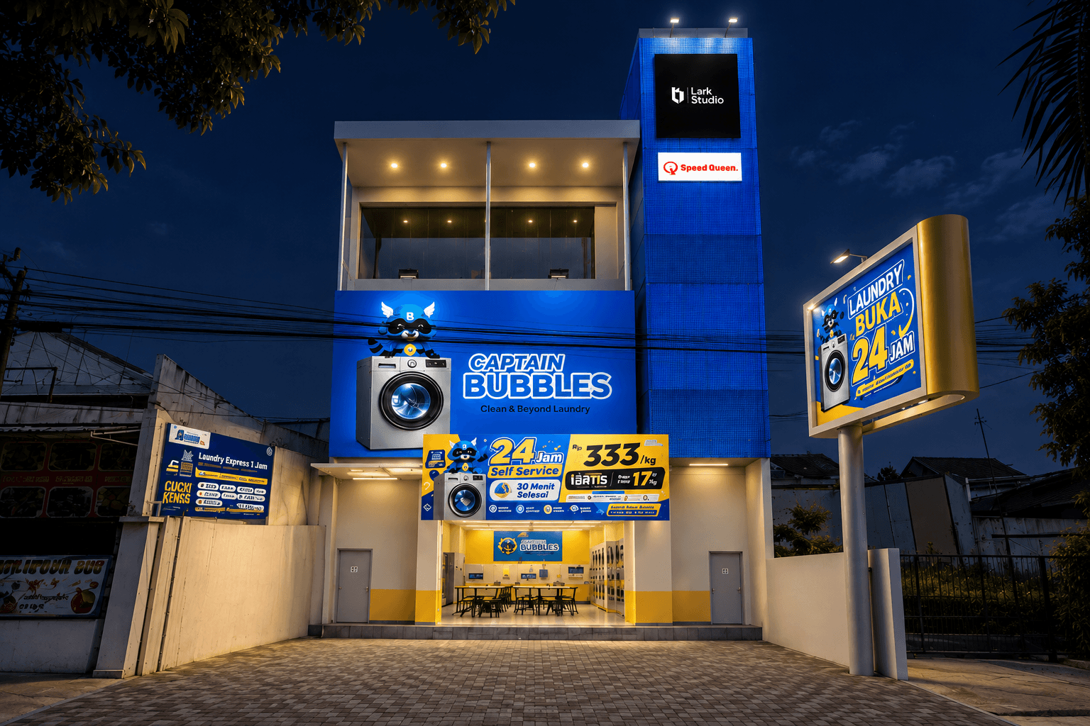 The same facade at dusk, the shopfront lit.