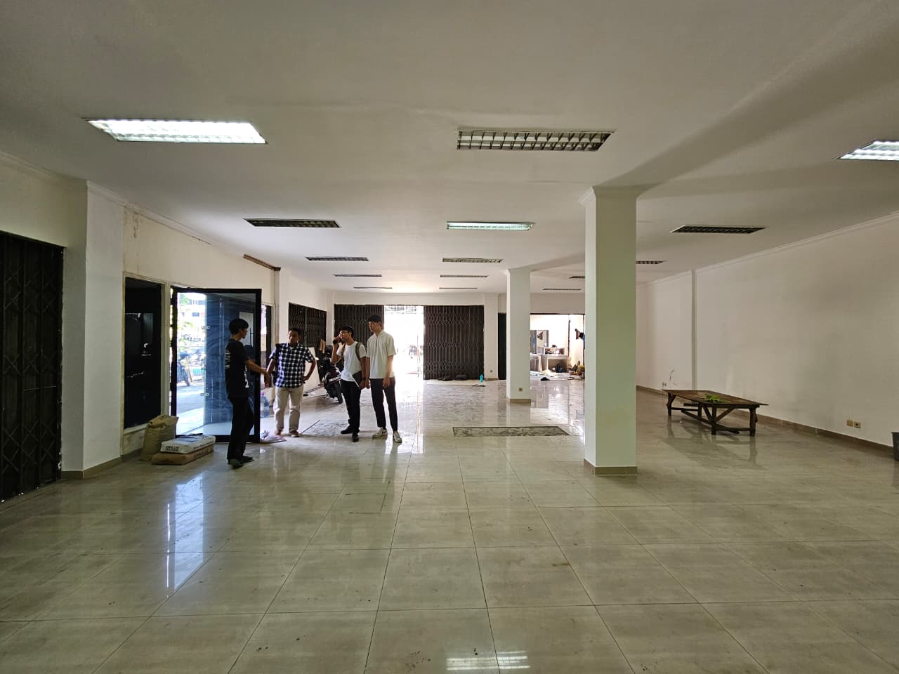 Walking an empty floor, column by column.
