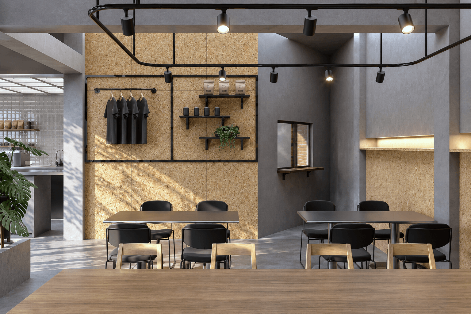 Merchandise wall of timber panels and black grid shelving above communal tables.
