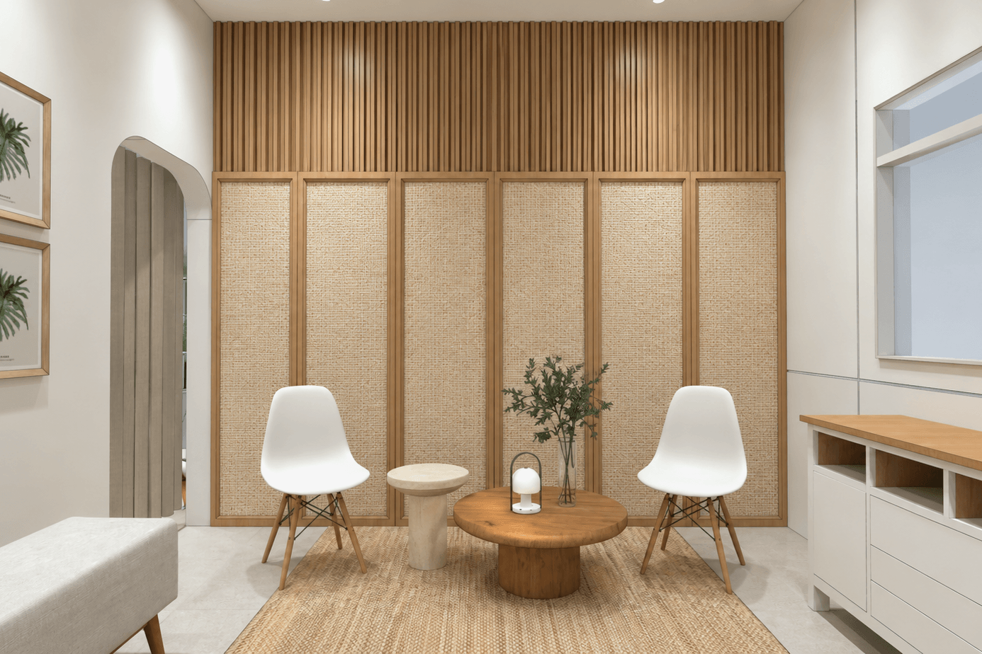 Family room with a folding rattan screen beneath timber slats, white chairs and a round table.