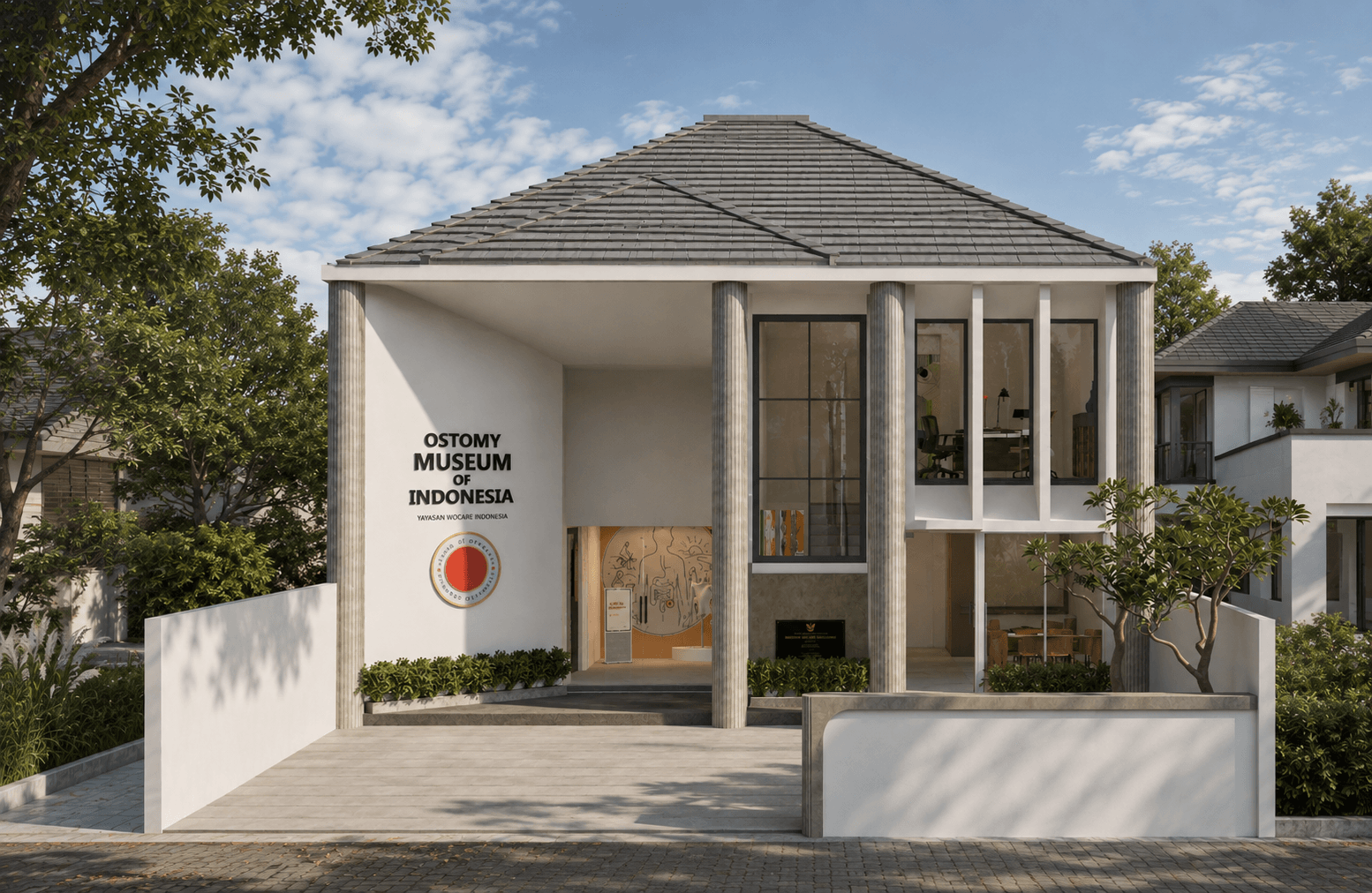The museum building: a pitched-roof house with a white columned portico, the Ostomy Museum of Indonesia sign on its facade.