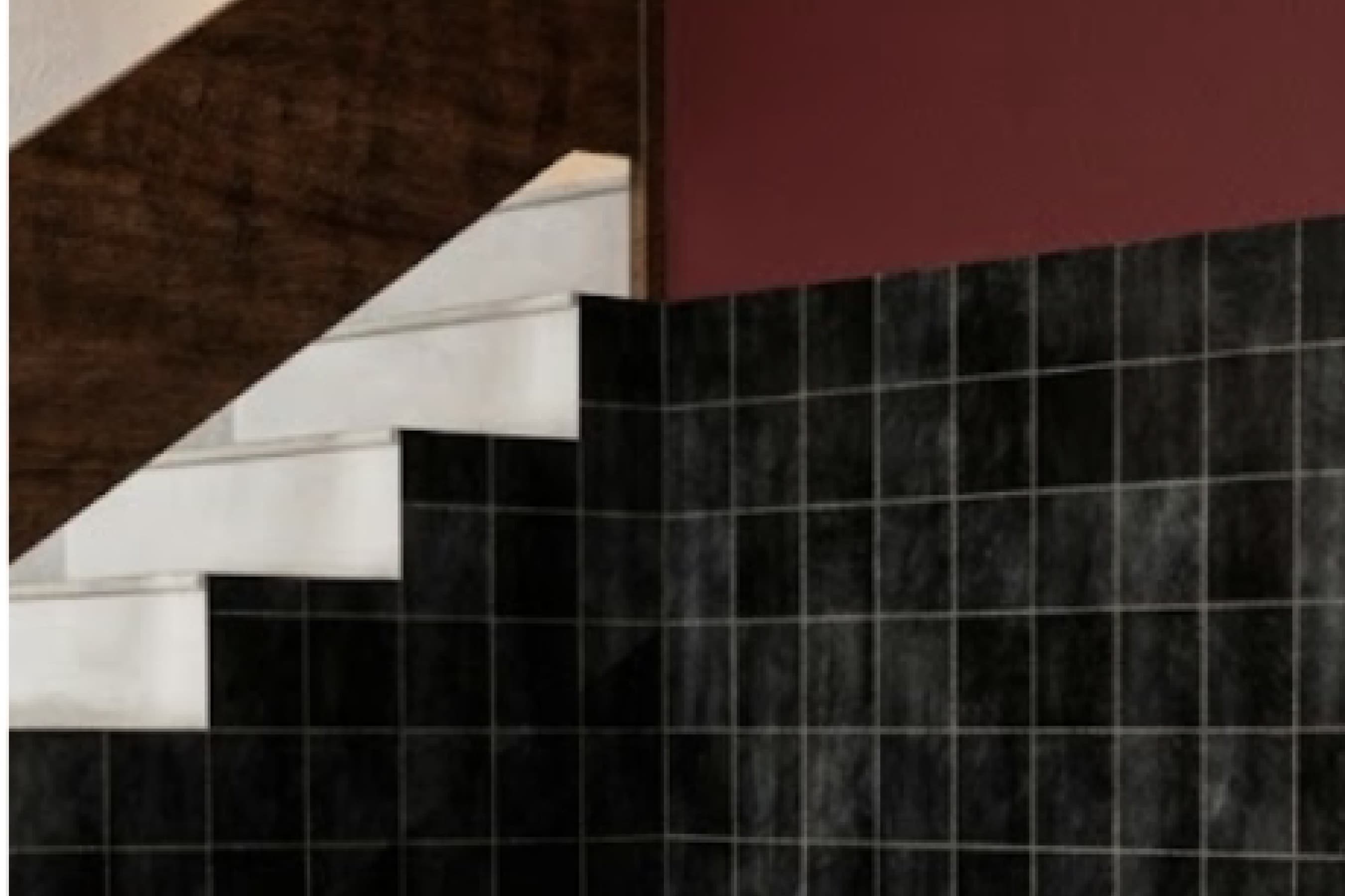 Staircase detail finished in dark green tile with a timber handrail and treads.