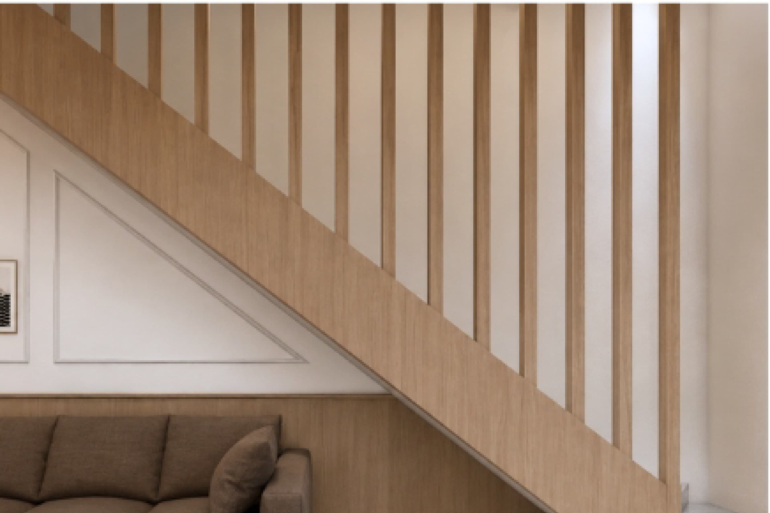 Staircase detail with a slatted timber balustrade against a plain wall.