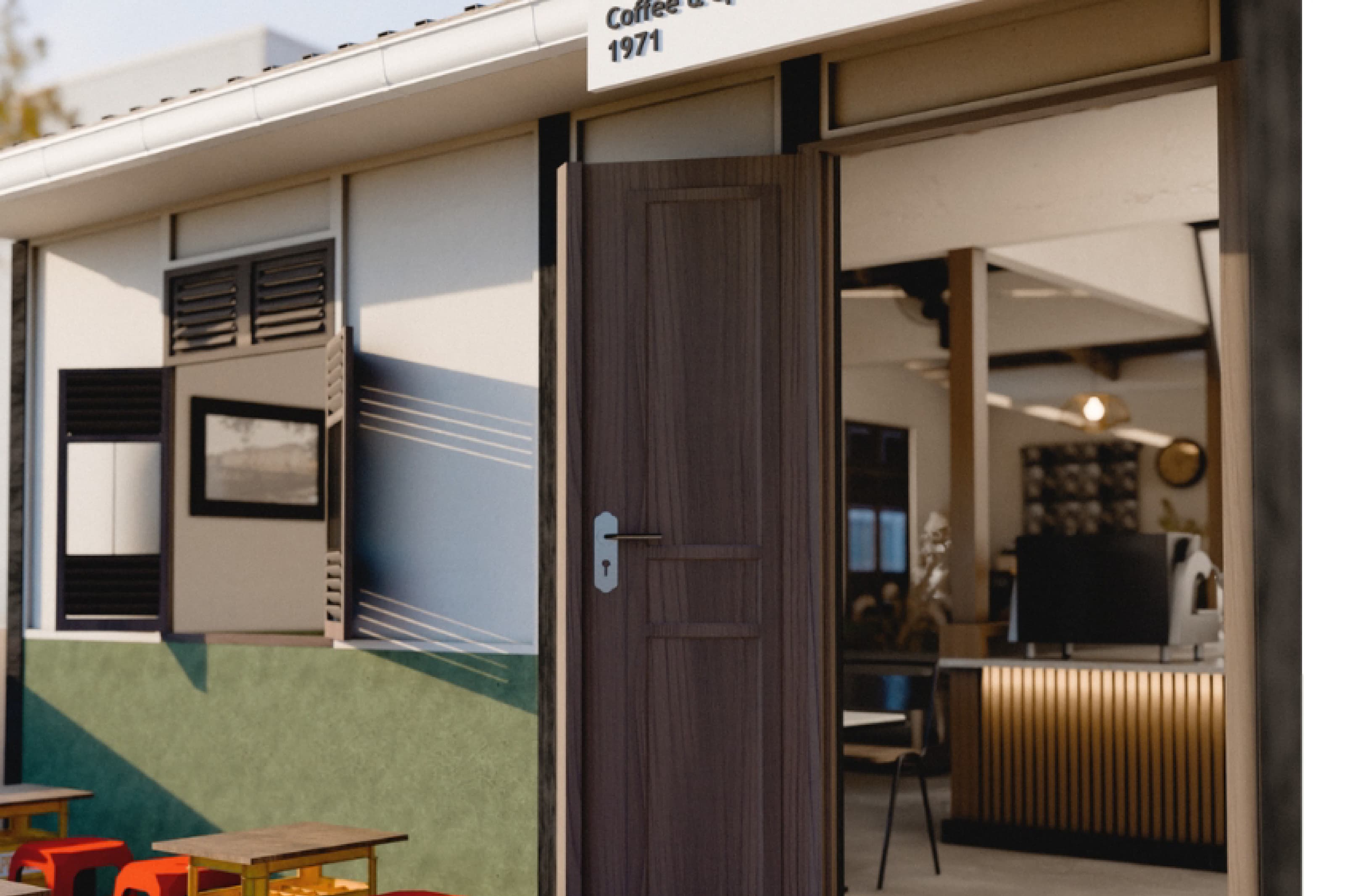 Weathered shophouse facade with a small entrance and hand-painted signage above the door.
